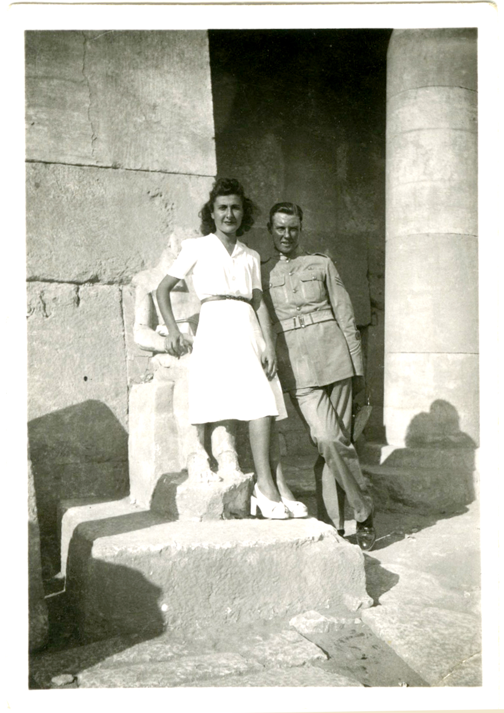 My mother, and my father in army uniform, beside an ancient statue, Egypt, c.1939
