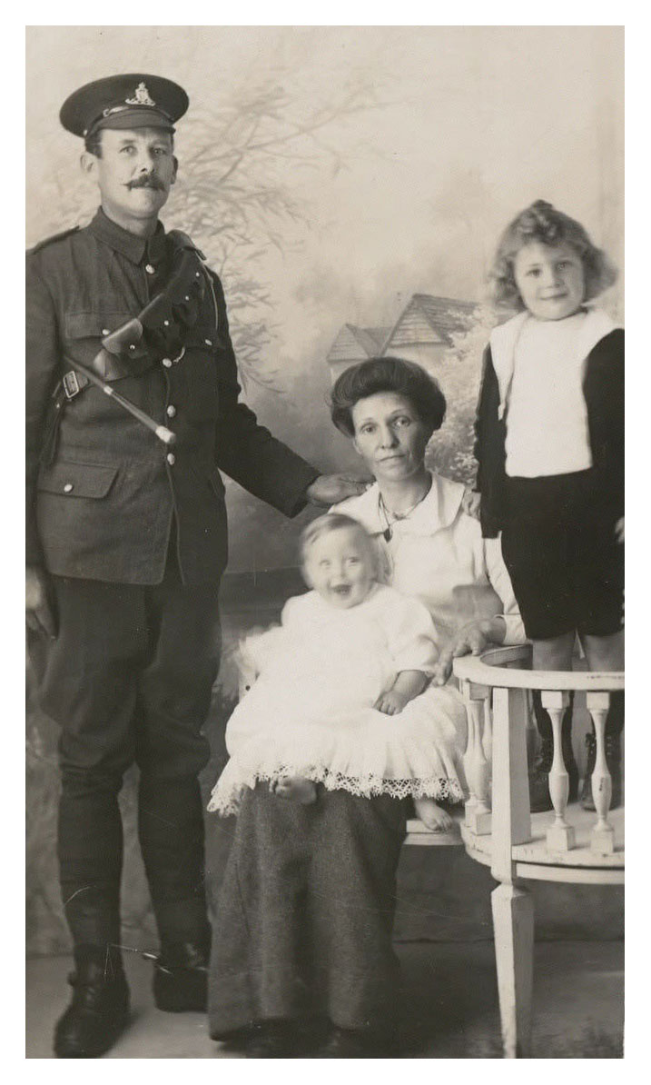 Sweet baby James, late 1916, with his parents and brother George